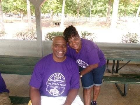 Two people at outdoor reunion pavilion